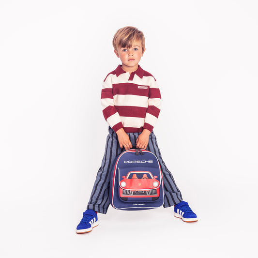 Toddler wearing Jeune Premier Ralphie backpack Porsche