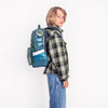 Boy wearing Jeune Premier New Bobbie Puffer Green school backpack, age 6 and up